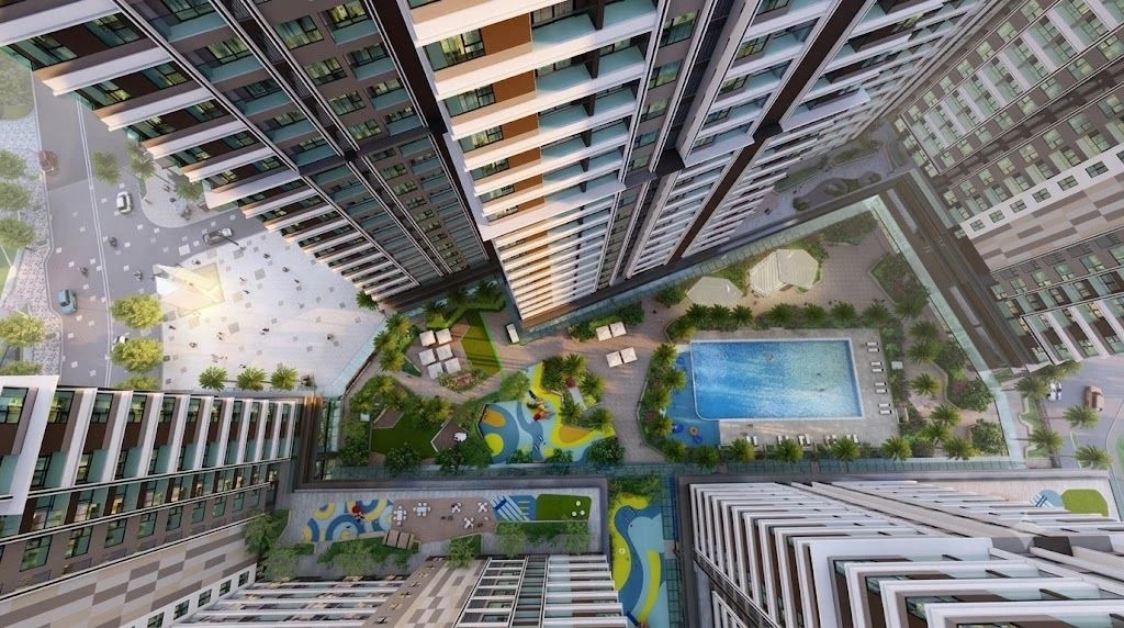 Góc nhìn từ trên cao xuống khu vực hồ bơi và công viên nội khu Akari City.