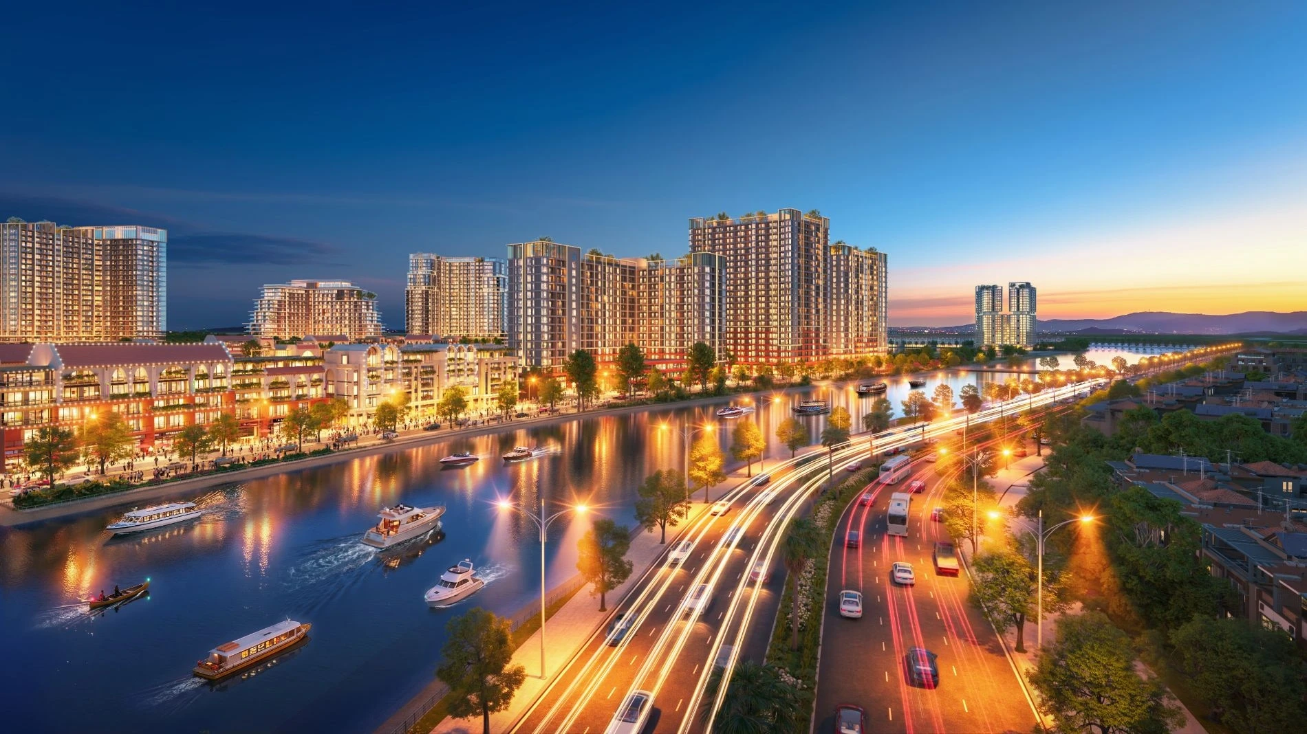 Tuyến đường ven sông và các tòa nhà rực rỡ ánh đèn về đêm tại Charmora City
