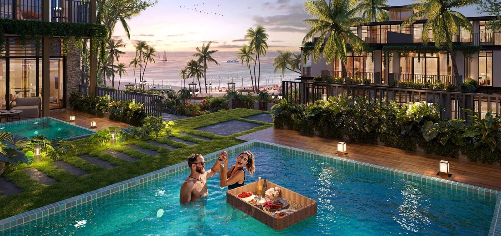 Cặp đôi đang tận hưởng bữa sáng nổi tại hồ bơi riêng của căn biệt thự Park Villa dưới ánh hoàng hôn.