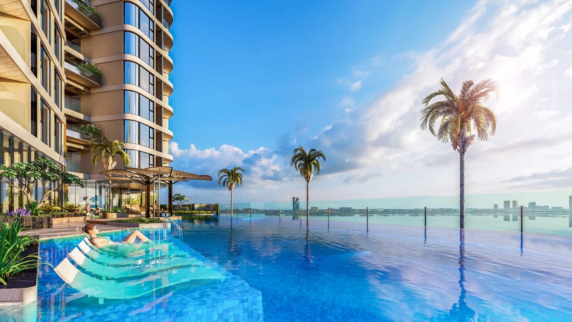 Khu vực sàn tắm nắng ngập nước với các ghế nằm thư giãn đặt trực tiếp dưới làn nước nông tại Thảo Điền Green.