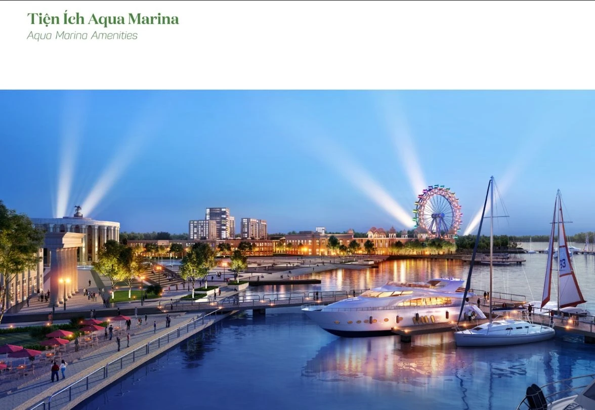Khung cảnh bến du thuyền Aqua Marina và vòng quay mặt trời rực rỡ ánh đèn về đêm